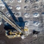 Open pit mine production drilling